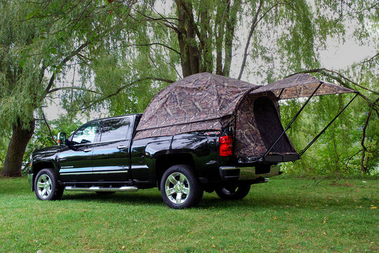 Napier camo truck tent camping set up